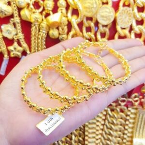 23K Gold Beaded Bangle (1 Baht / 15.2g) showing the delicate dot link design and deep 96.5% purity.
