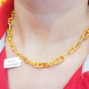 Model wearing a substantial 23K Thai Gold Chain (2 Baht weight) featuring a polished Anchor Link (Mariner Link) design.